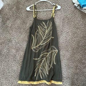 Olive green dress with gold embroidery and some sequence.